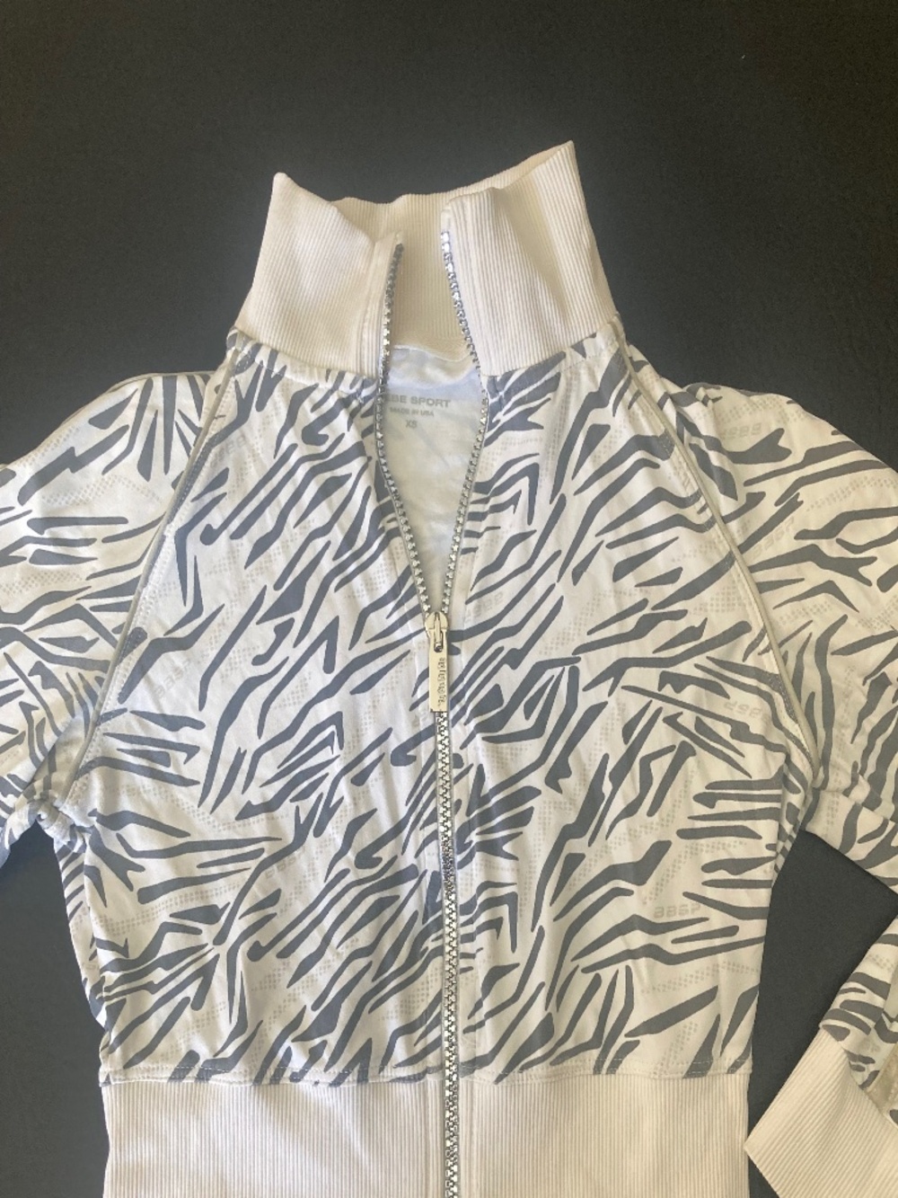 Bebe sport white gray animal print silver zipper cropper jacket top xs